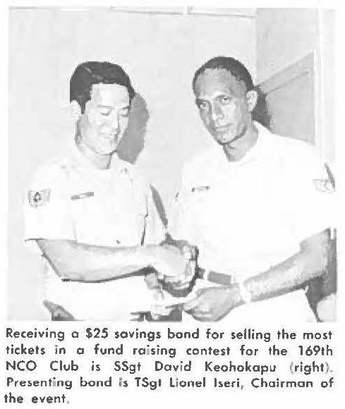 Receiving a $25 savings bond for selling the most tickets in a fund raising contest for the 169th NCO Club is SSgt David Keohokapu (right). Presenting bond Is TSgt Lionel Iseri, Chairman of the event.