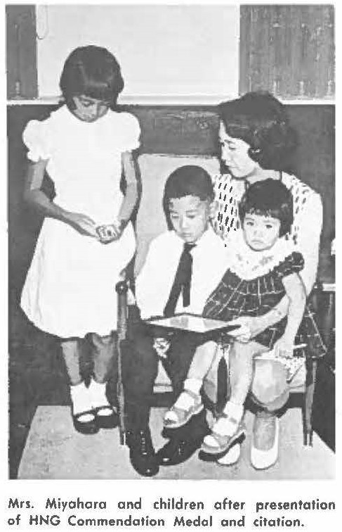 Mrs. Miyahara and children after presentation of HNG Commendation Medal and citation.