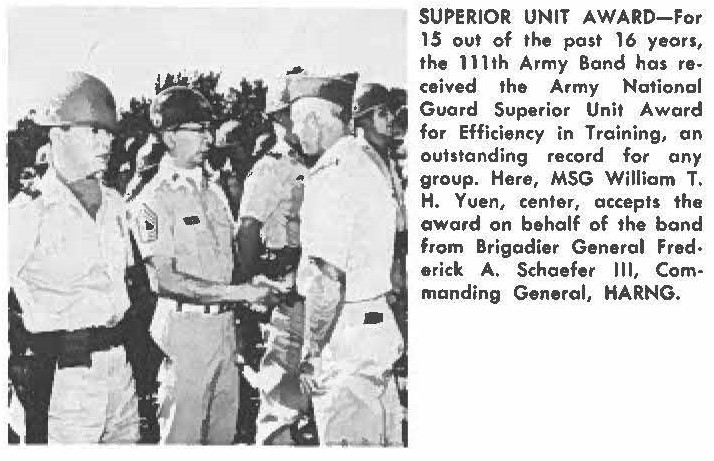 SUPERIOR UNIT AWARD-for 15 out of the past 16 years, the 111th Army Band has received the Army National Guard Superior Unit Award for Efficiency in Training, or, outstanding record for any group. Here, MSG William T. H. Yuen, center, accepts the award on behalf of the band from Brigadier General Frederick A. Schaefer III, Commanding General, HARNG.