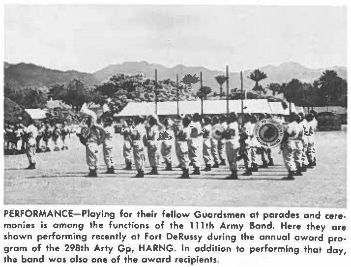 PERFORMANCE-Playing for their fellow Guardsmen at parades and ceremonies is among the functions of the 111th Army Band. Here they are shown performing recently at Fort DeRussy during the annual award program of the 298th Arty Gp, HARNG. In addition to performing that day, the band was also one of the award recipients.