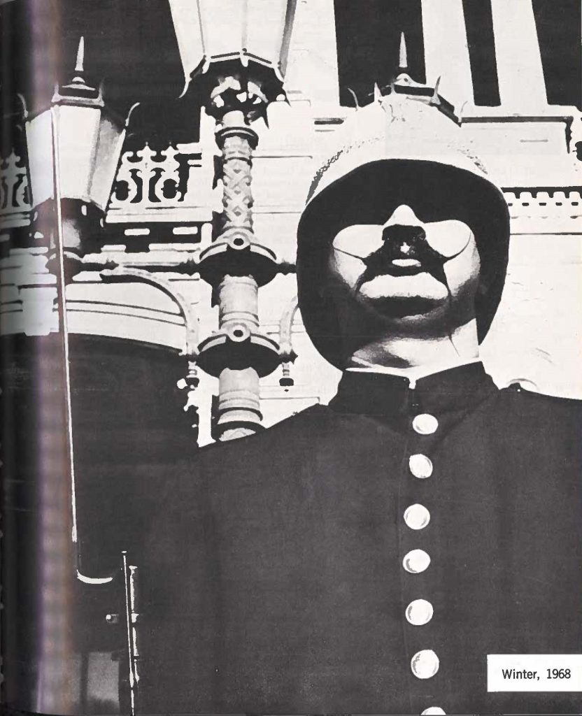 a member of the Royal Guard stands guard at Iolani Palace during ceremonies commemorating the birthday of King Kalakaua and the fifth anniversary of the Royal Guard, See related story on page 12. Photo by SP4 Paul Chun.
