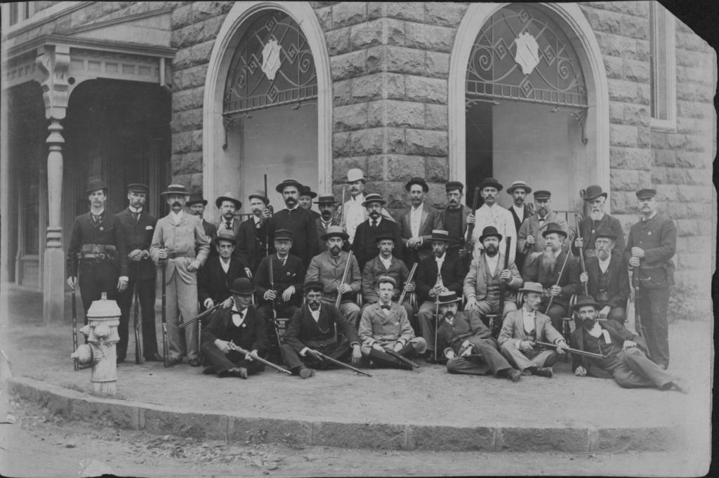 Citizens' Guard- Masonic Temple; Military Citizen's Guard. Taken in front of Masonic Temple. Building on Alakea and Hotel Streets
