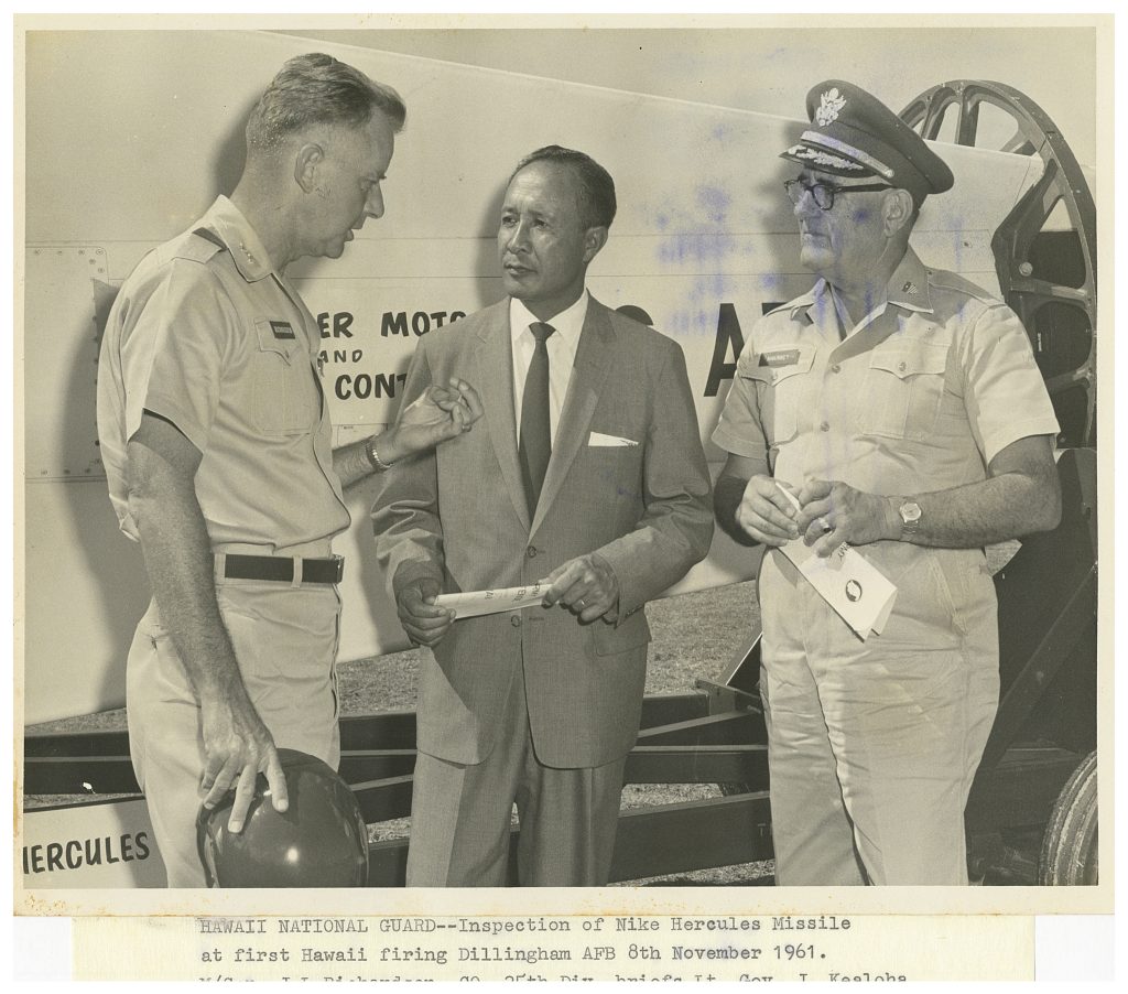 We776-2780/GP61 Schofield Barracks L to R: Maj Gen J L Richardson, CO 25th Inf Div; Hawaiiʻs Lt Governor James Kealoha and Maj Gen Fred W Makinney, Hq HARNG inspects a Nike Hercules Missle Prior to the first Hawaii Firing at Dillingham AFB. The firing was done by members of the Hawaii Army National Guard , Btry C, 2nd Msl Bn, 298th Arty Gp (Air Defense) during the first annual Service Practice. 8 November 1961 Photo by SFC Ronald Shook 125th Signal Battalion (Inf Div) APO 25