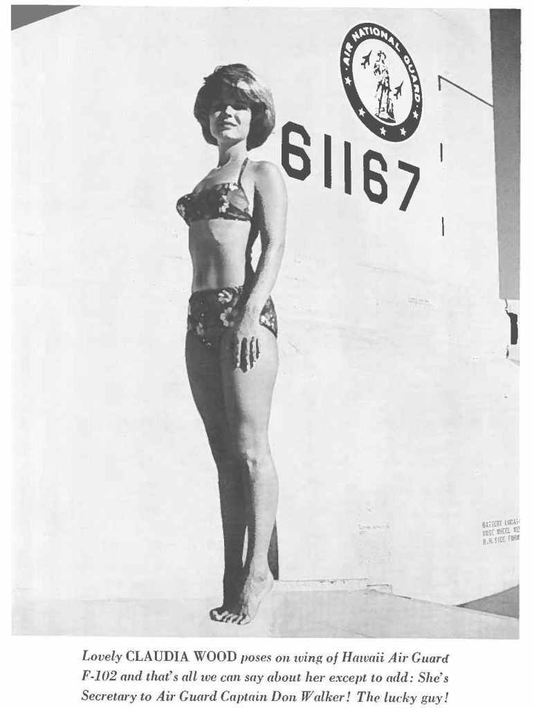 Lovely CLAUDIA WOOD poses on wing of Hawaii Air Guard F-102 and that's all we can say about her except to add: Size's Secretary to Air Guard Captain Don Walker! The lucky guy!