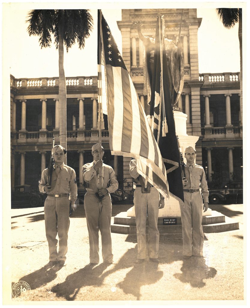 10.03.1946 CPA-46-4744 Honolulu, T.H. Protectors of the paradise of the pacific, set forth by King Kamehameha 1, Shown before their illustrious predecessor are, left to right, S/Sgt. Harold L. Yap, M/Sgt. Fred K. Robello, Captain William J. West and S/Sgt. Robert O Graham. (Signal Corps Photo) T/4 Keating, 3925 SIG Photo Ser Co