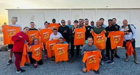 Soldiers of the 1950th Contingency Contracting Team participated in the annual Turkey Trot run at Camp Arifjan, Kuwait, on Nov. 23 2023, during Operation Spartan Shield. While the formation included many participants across the installation, our team proudly joined in, demonstrating spirit de corps, fitness, and resilience while deployed overseas.