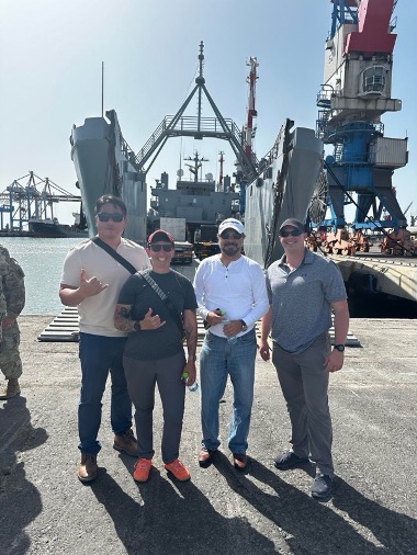 Staff Sgt. Jonthan Yi of the 1950th Contingency Contracting Team, with fellow contractors at the port in Camp Arifjan, Kuwait, during Operation Spartan Shield. From the frontlines, contracting ensures that Soldiers have the resources, services, and support needed to keep the mission moving forward.
