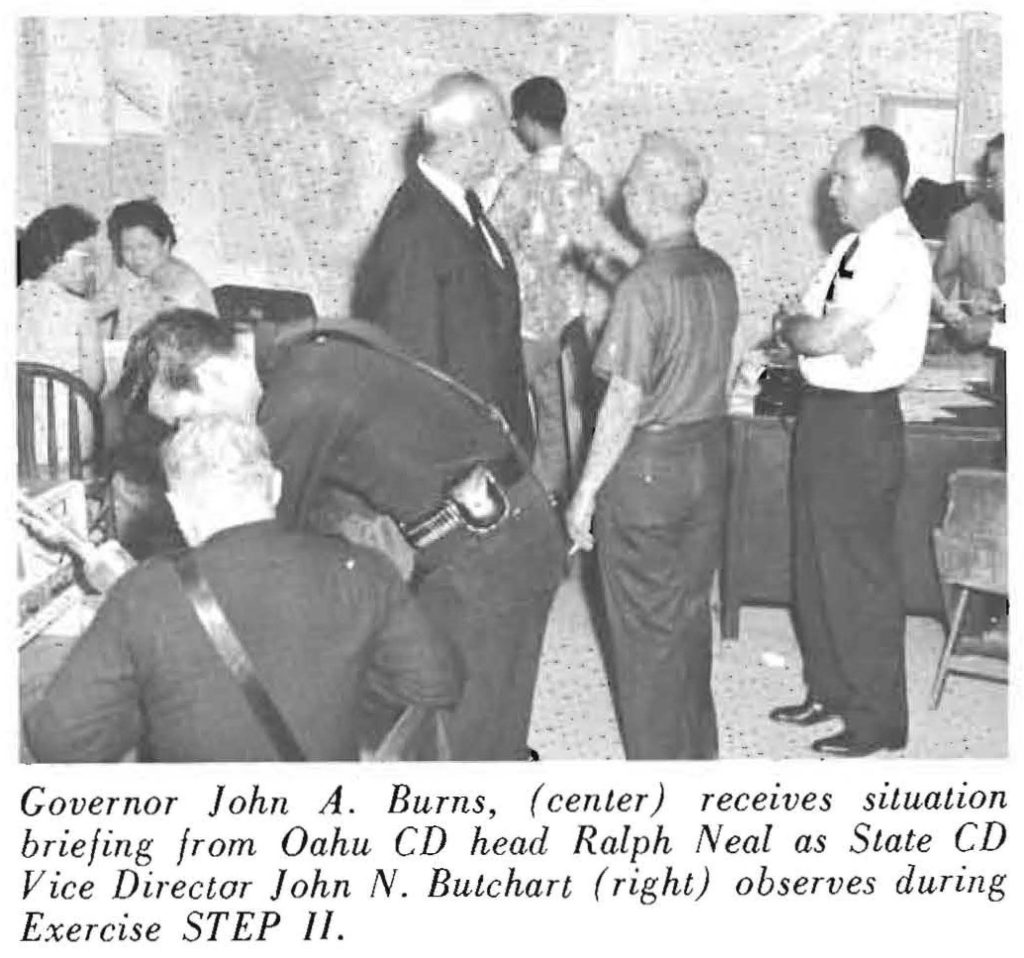 Governor John A. Burns, (center) receives situation briefing from Oahu CD head Ralph Neal as State CD Vice Director john N. Butchart (right) observes during Exercise STEP II.