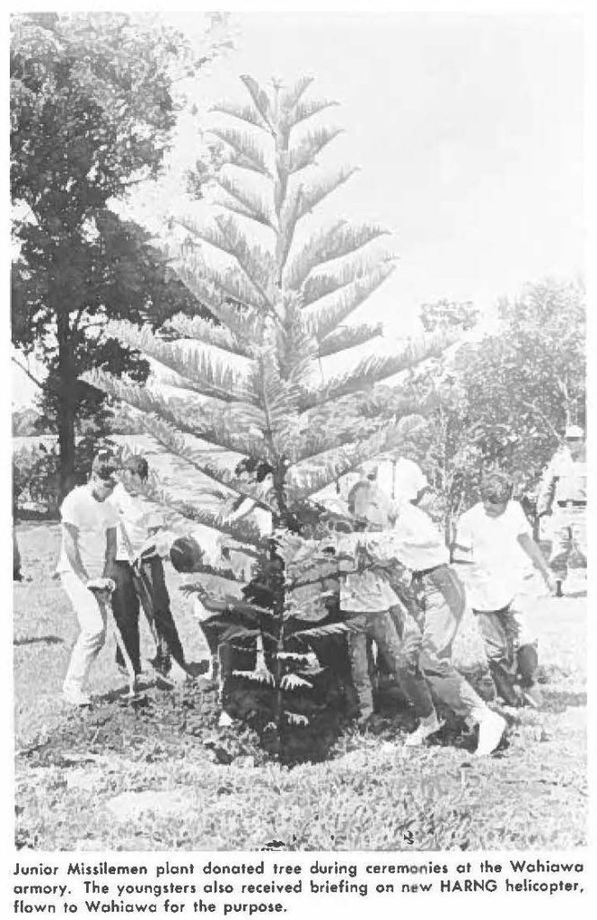 Junior Missilemen plant donated tree during ceremonies at the Wahiawa ceremony. The youngsters also received briefing on new HARNG helicopter, flown to Wahiawa for the purpose.
