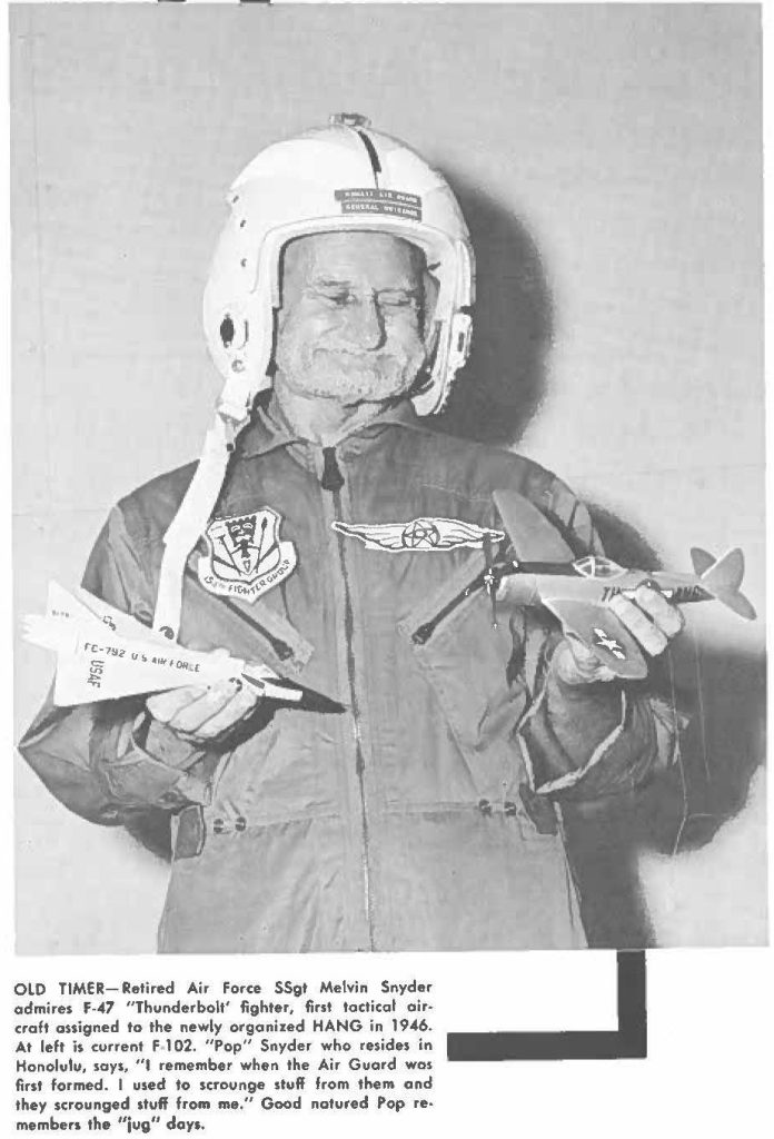 OLD TIMER- Retired Air Force SSgt Melvin Snyder admires F-47 "Thunderbolt' fighter, first tactical aircraft assigned to the newly organized HANG in 1946. At left is current F 1 02. "Pop" Snyder who resides in Honolulu, soys, "I remember when the Air Guard was first farmed. I used to scrounge stuff from them and they scrounged stuff from me." Good natured Pop remembers the "jug" days.