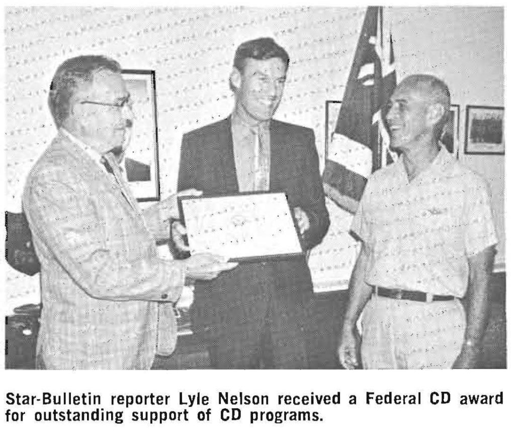 Star-Bulletin reporter Lyle Nelson received a Federal CD award for outstanding support of CD programs.