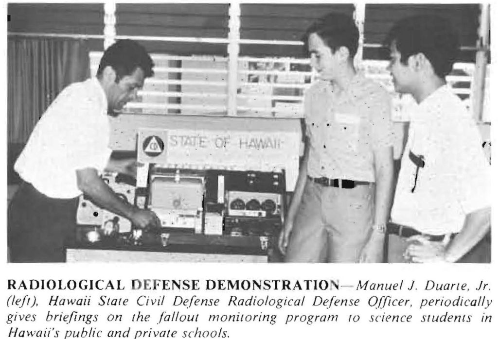 RADIOLOGICAL DEFENSE DEMONSTRATION- Manuel J. Duarte, Jr. (Left), Hawaii State Civil Defense Radiological Defense Officer, periodically gives briefings on the fallout monitoring program 10 science students in Hawaii's public and private schools.