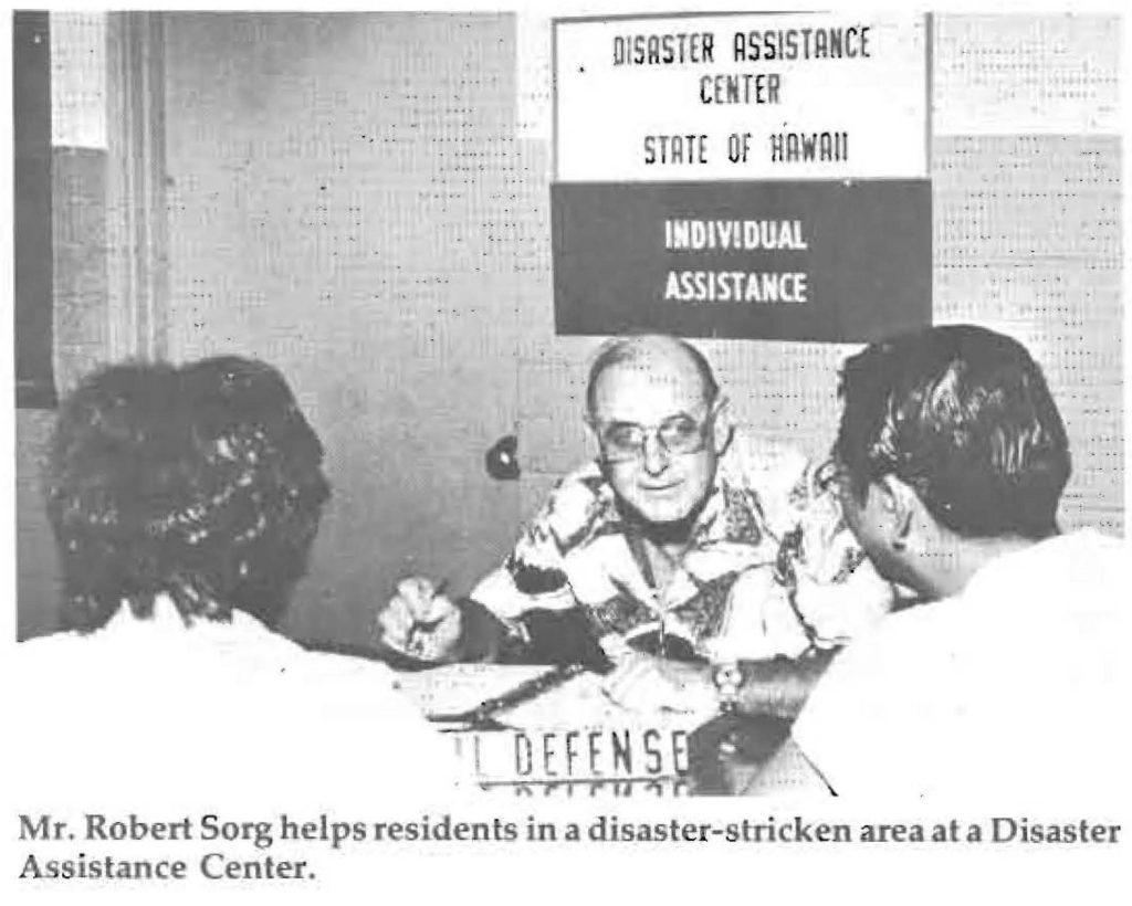 Mr. Robert Sorg helps residents in a disaster-stricken area at a Disaster Assistance Center.