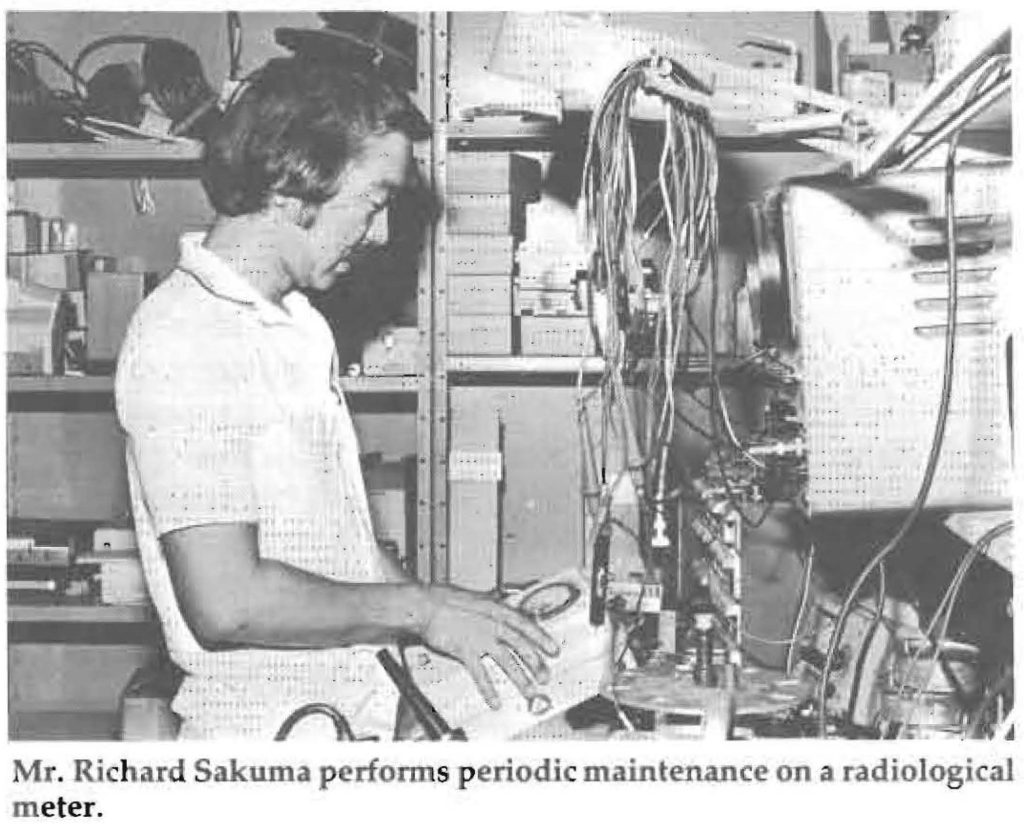Mr. Richard Sakuma performs periodic maintenance on a radiological meter.