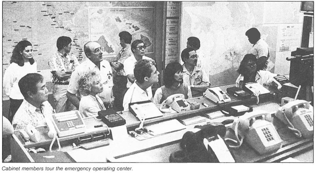 Cabinet members tour the emergency operating center.