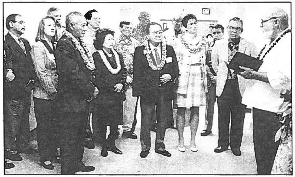 The Rev. Bill Pifer of Keolahou Church, Maalaea, conducts a traditional blessing for the opening of the Pacific Disaster Center. Among the dignitaries attending the ceremony are (L to R) Maj. Gen. EdwardV. Richardson, U.S. Rep. Patsy Mink, U.S. Sen. Daniel Inouye, Maui Mayor Linda Crockett-Lingle, and Roy Price, State Civil Defense vice-director. Photo by Ron Matasumra