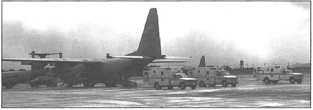 SIMULATED EMERGENCY ASSISTANCE- A C-130 Hercules cargo aircraft simulates mass casualty evacuation procedures with ambulances during hurricane Exercise MAKANJ PAHILl MAY 1998. Tech. Sgt. Wayne G. Pontes photo