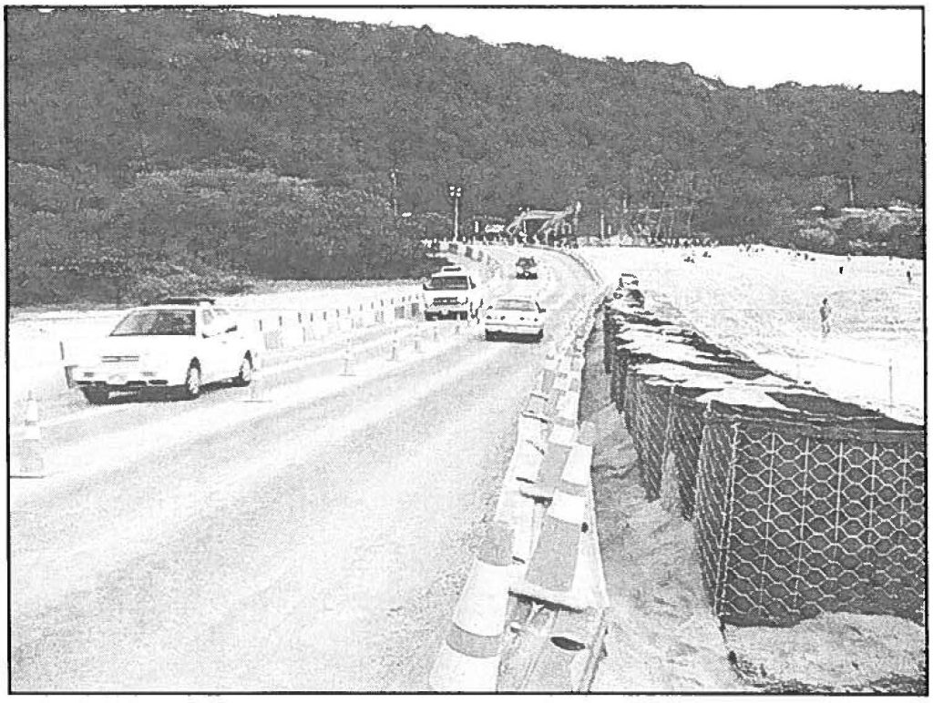 "H2O FREEWAY - The temporary bypass road to the North Shore of Oahu was affectionately call the H20 because it was built over water after a rockslide close Kamehameha Highway in March. State Civil Defense photo