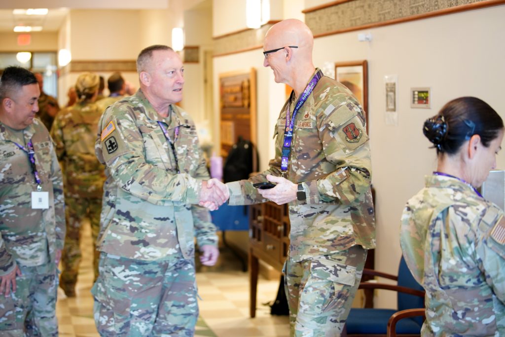 Maj. Gen. Stephen Logan, Hawai‘i Adjutant General, left, and Maj. Gen. Joseph Harris, Hawaiʻi Air National Guard Commander, at the Joint Commander’s Conference in July at Joint Base Pearl Harbor-Hickam. (Photo by retired Master Sgt. Andrew Jackson)