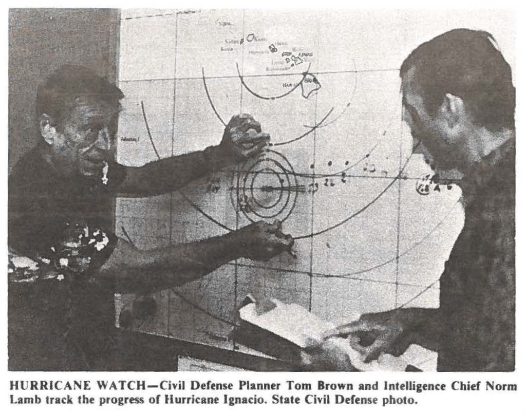 HURRICANE WATCH-Civil Defense Planner Tom Brown and Intelligence Chief Norm lamb track the progress of Hurricane Ignacio. Stale Civil Defense photo.