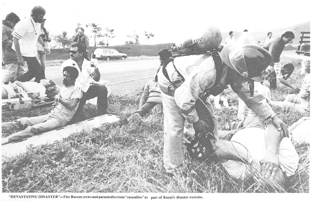 "DEVASTATING DISASTER "-Fire Rescue crews and paramedics treat "casualties" as part of Kauai's disaster exercise.