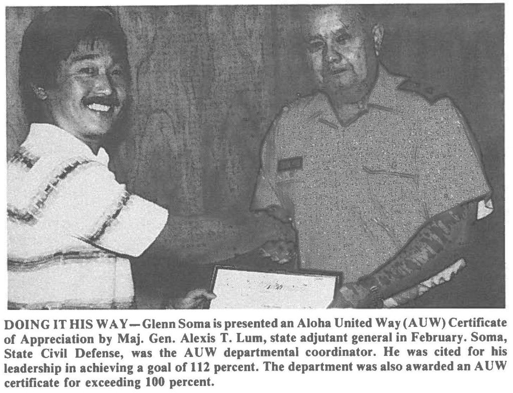 DOING IT HIS WAY - Glenn Soma is presented an Aloha United Way (AUW) Certificate of Appreciation by Maj. Gen. Alexis T. Lum, state adjutant general in February. Soma, State Civil Defense, was the AUW departmental coordinator. He was cited for his leadership in achieving a goal of 112 percent. The department was also awarded an AUW certificate for exceeding 100 percent.