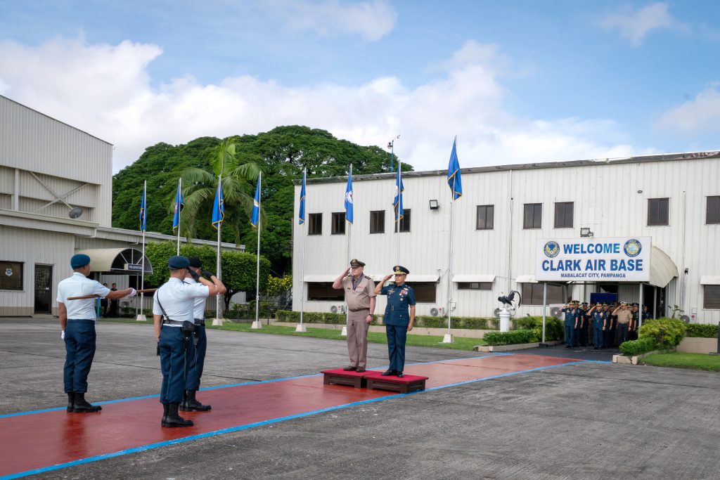 Hawai‘i Adjutant General Maj. Gen. Stephen Logan and Armed Forces of the Philippines Air Force Brig. Gen. Jose Bonafacio, 410 Maintenance Wing commander, rendered honors during a pass and review at Clark Air Base, Mabalacat City, Pampanga, Philippines on Sept. 25, 2025. (Hawai‘i Air National Guard photo by Senior Master Sgt. Mysti Bicoy)