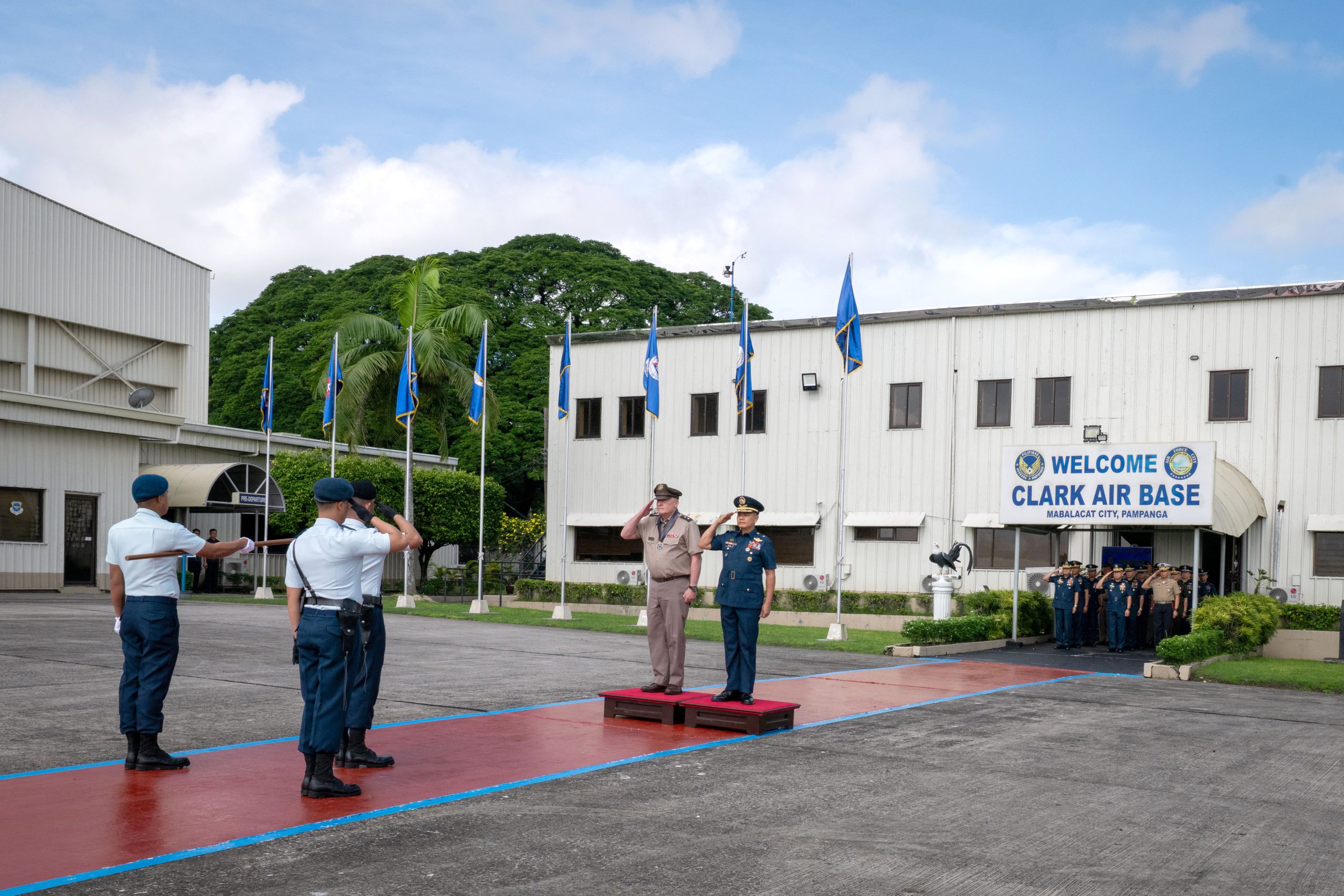 Hawai‘i Adjutant General Maj. Gen. Stephen Logan and Armed Forces of the Philippines Air Force Brig. Gen. Jose Bonafacio, 410 Maintenance Wing commander, rendered honors during a pass and review at Clark Air Base, Mabalacat City, Pampanga, Philippines on Sept. 25, 2025. (Hawai‘i Air National Guard photo by Senior Master Sgt. Mysti Bicoy)