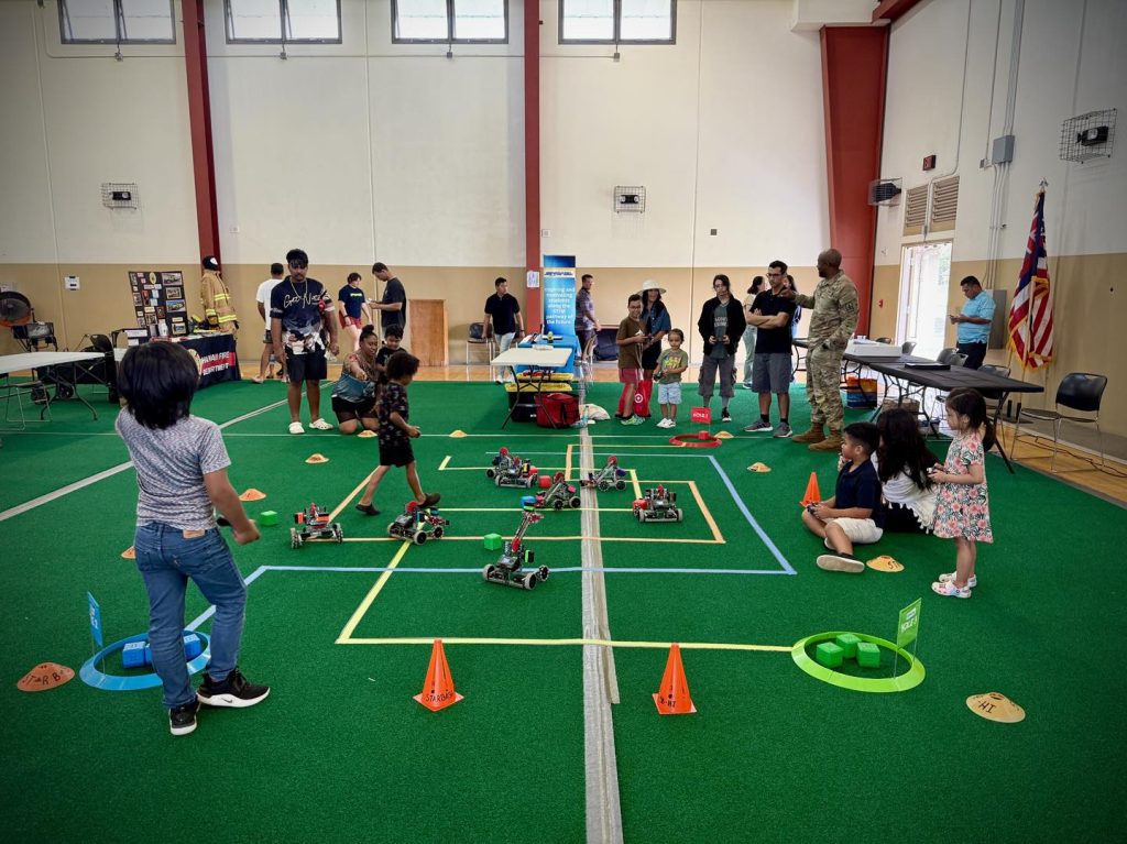 In June, STARBASE Hawai’i participated in robotics challenges at the Hawai’i Army National Guard’s CAV-299th Family day, above, and students, below attended the UH Hilo PISCES STARS Program. (STARBASE Hawai‘i photos)