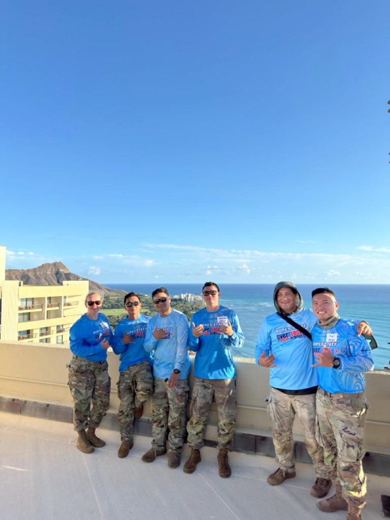 1st Lt. Karen Kaupp, left, Specialist Elvis Salinas, Sgt. Daysen Chang, Sgt. Makoa Frias, Staff Sgt. Jesse Jackola and Sgt. Paul Gallardo flashed shakas.