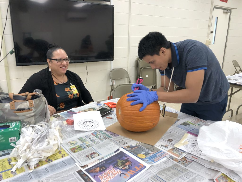 Halloween pumpkin carving, food sale supports Aloha United Way