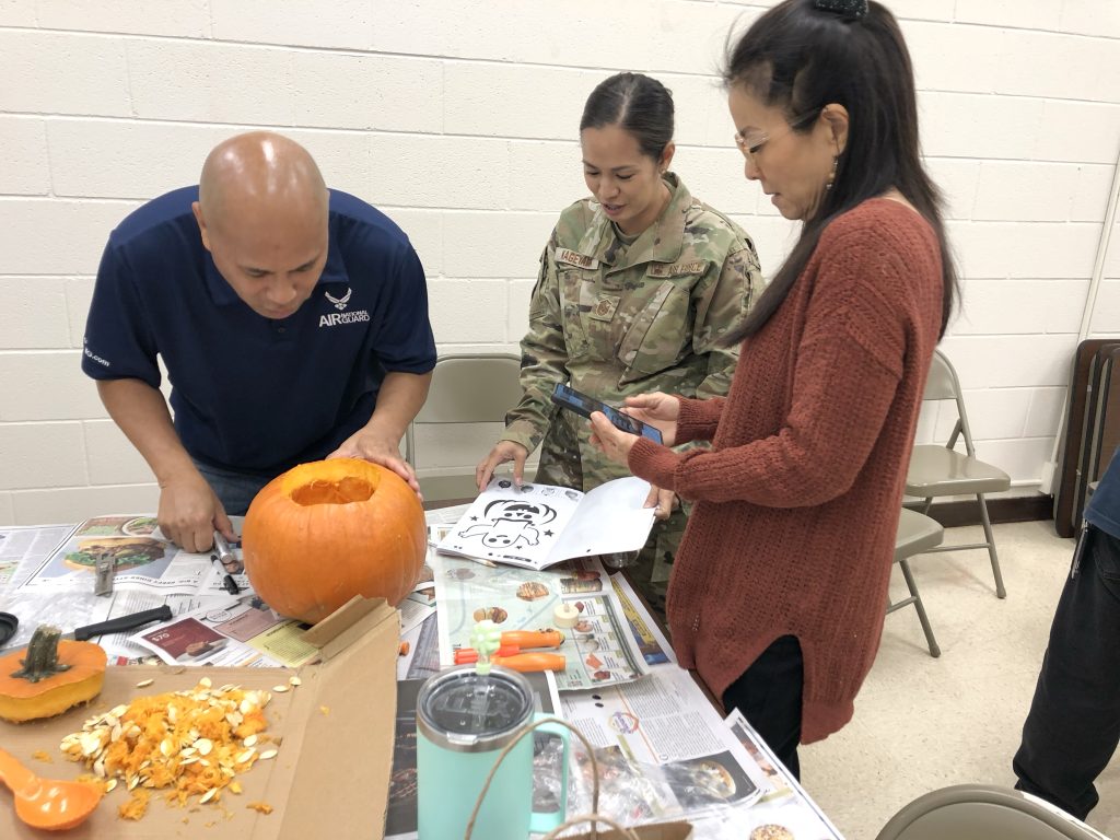 Halloween pumpkin carving, food sale supports Aloha United Way
