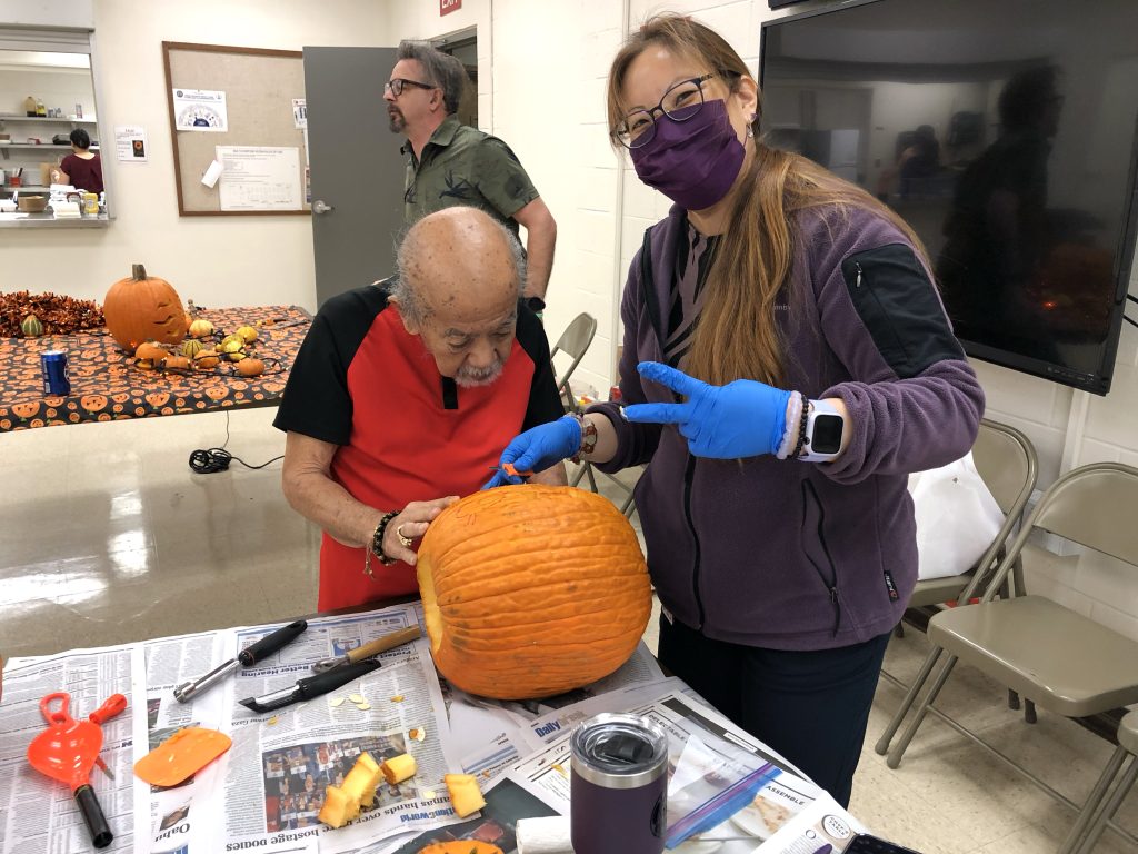 Halloween pumpkin carving, food sale supports Aloha United Way