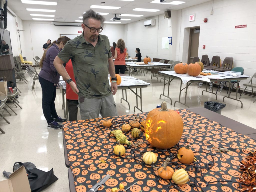 Halloween pumpkin carving, food sale supports Aloha United Way