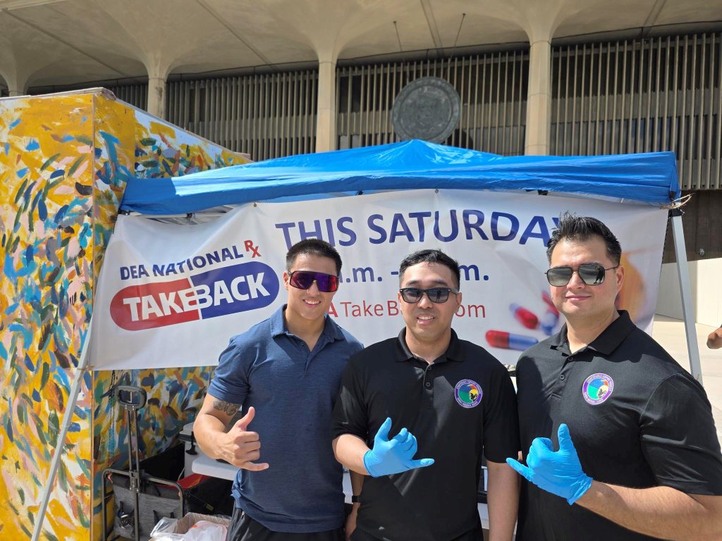 Sgt. Samson Achuela, Staff Sgt. Brandon Corales and Sgt. 1st Class Waylen Mendoza supported collection efforts during the National Take-Back Initiative event at the Hawaiʻi State Capitol.
