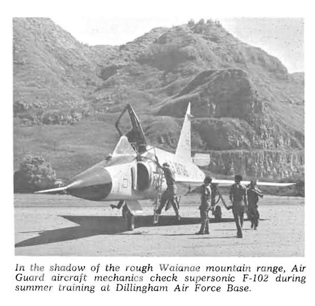In the shadow of the rough Waianae mountain range, Air Guard aircraft mechanics check supersonic F-102 during summer training at Dillingham Air Force Base. (State of Hawai‘i Department of Defense 1966 annual report)