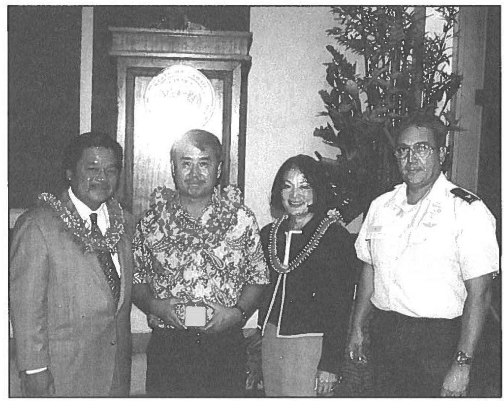 EXECUTIVE RECOGNITION Wallace Mitsui, Hawaii State Department of Defense employee of the yew; poses with Gov. Benjamin J. Cayetano, Lt. Gov. Mazie Hirano and Col. Orlan Peterson J,:, the deputy adjutant general, at the Distinguished State Service Awards ceremony. Deborah M.Sanders Murray photo