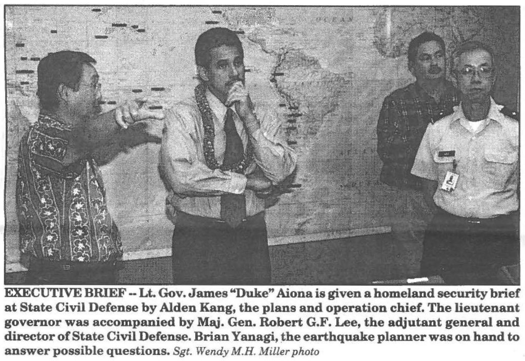 EXECUTIVE BRIEF - Lt. Gov. James "Duke" Aiona is given a homeland security brief at State Civil Defense by Alden Kang, the plans and operation chief. The lieutenant governor was accompanied by Maj. Gen. Robert G.F. Lee, the adjutant general and director of State Civil Defense. Brian Yanagi, the earthquake planner was on band to answer possible questions. Sgt. Wendy M.H. Miller photo