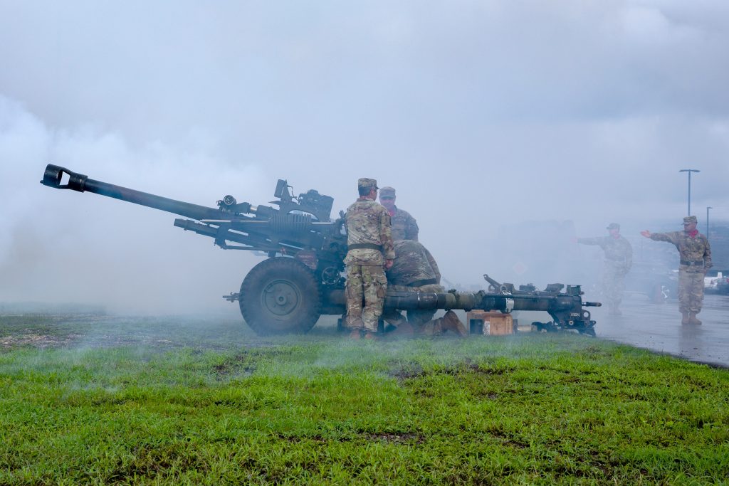 Soldiers assigned to 1st Battalion, 487th Field Artillery Regiment, 29th IBCT fired a 13-volley-cannon-salute with three M119A3 105mm howitzer cannons. U.S. Army National Guard photo by Staff Sgt. Justin Nye