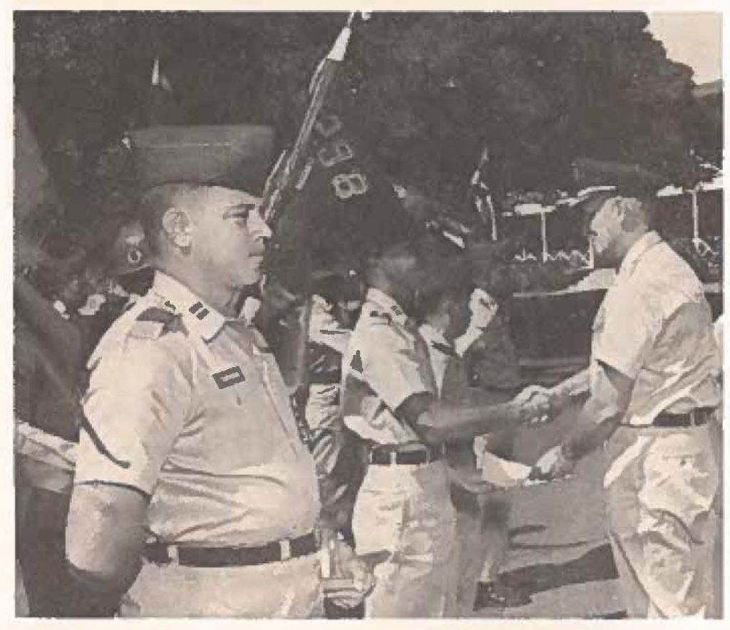 Capt Alvin S. Cabrihina holds trophy presented by General Darnell for establishing worlds distance record during last ASP Photo show1 General Darnell presenting Honor Battery certificate, to Cop! Rosario Daguio, Btry A, 2nd Missle Bn. Also receiving certificates were Lt George Honjiyo, Btry C and Capt Richard Kaulukukui Btry D, all of 2nd Missile Bn.. Ceremonies took place at Fort Ruger l0 November.