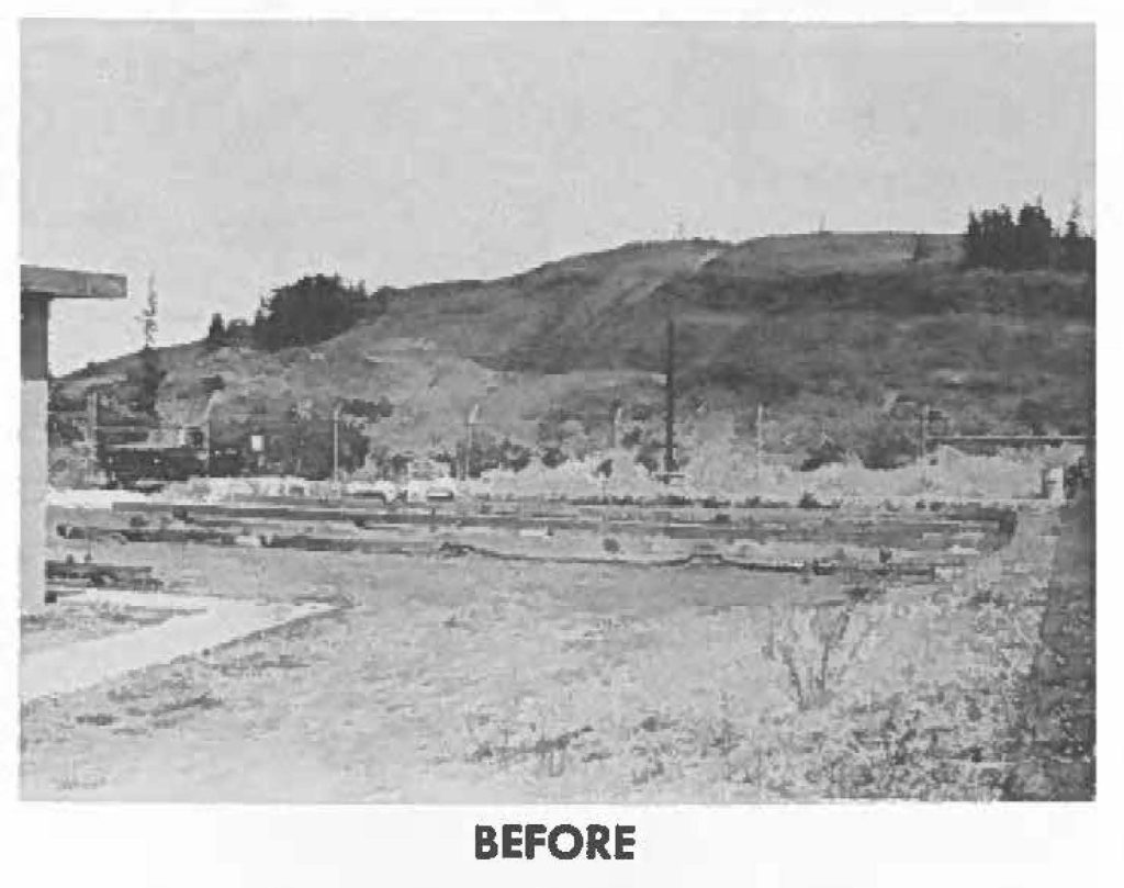 GOVERNMENT ACCOUNTING OFFICE (GAO) PLEAS-E NOTE: Battery "B" 1st Missile Battalion, needed a motor pool shed in which they could adequately perform maintenance on assigned vehicles. Because no money was available lo construct facilities, unit personnel decided they would build it themselves. Plans, which received OK from Guard and USARHAW, were drawn by PFC Pedro lemasa (fulltime Asst. IFC Operator) and "scouts" scattered in all directions lo scrounge needed materials. Right photo shows SP4 William Asinsen, fulltime wheel vehicle mechanic in charge of project (left) and Pvt Grand l. Hussey, launcher helper who did early foundation work. Thirteen other HNG'men assisted on project during spare time. Shed, located inside fence of launcher Administrative area, was started in August and should be complete in December with pouring of concrete floor.