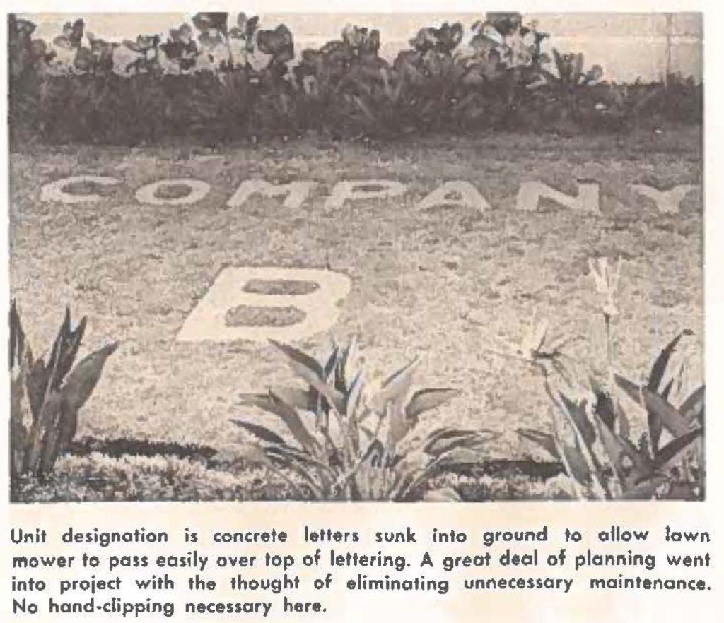 Unit designation is concrete letter. sunk into ground to allow lawn mower to cross easily over top of lettering. A great deal of planning went into project with the thought of eliminating unnecessary maintenance. No hand-clipping necessary here.