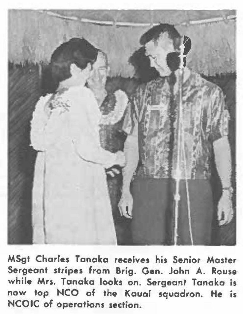 MSgt Charles Tanaka receives his Senior Master Sergeant stripes from Brig. Gen. John A. Rouse while Mrs. Tanaka looks on. Sergeant Tanaka is now top NCO of the Kauai squadron. He is NCOIC of operations section.