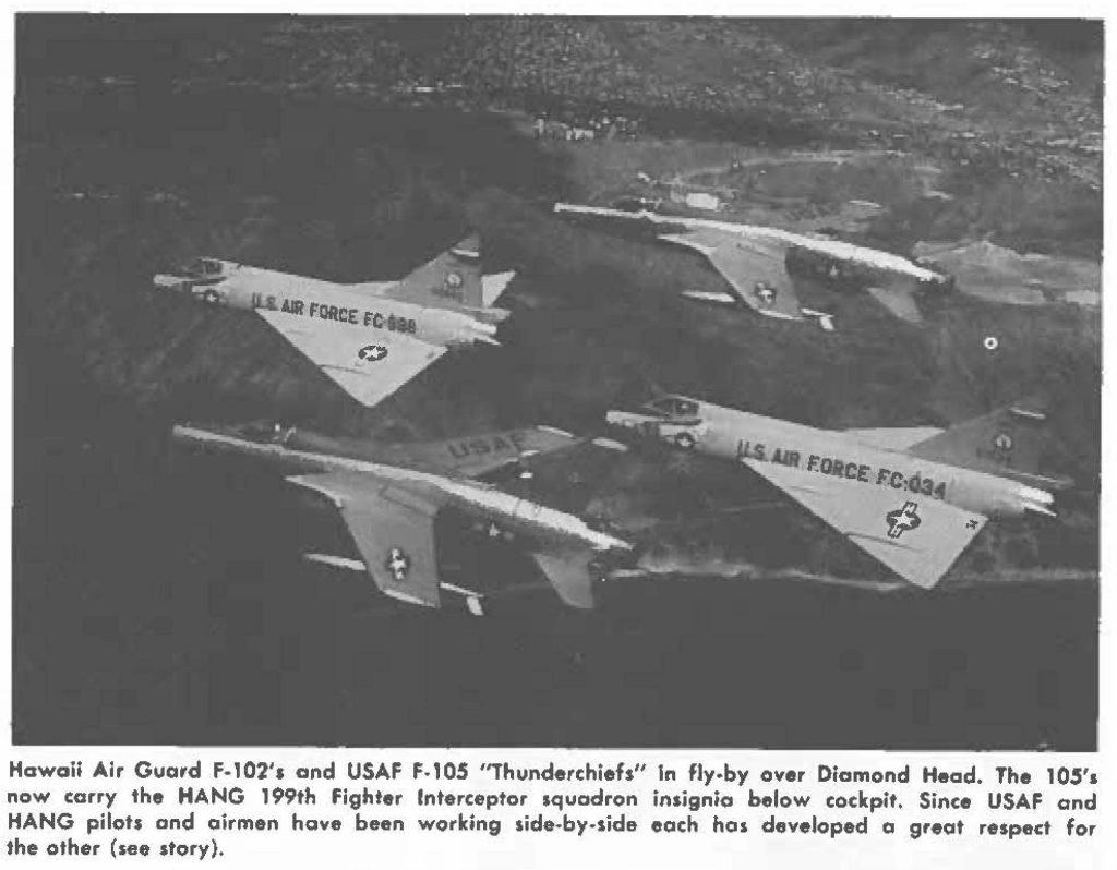 Hawaii Air Guard F-102'1 and USAF f.105 "Thunderchiefs" ln fly-by over Diamond Head. The 105's new carry the HANG 199th fighter Interceptor squadron insignia below cockpit, Since USAF and HANG pilots and airmen have been working side-by-side each has developed a great respect for the other (see story).