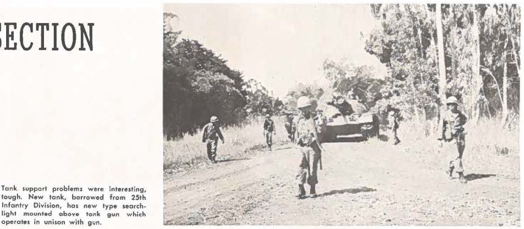 Tank support problems were interesting, tough. New tank, borrowed from 25th Infantry Division, has new type searchlight mounted above tank gun which operates in unison with gun.