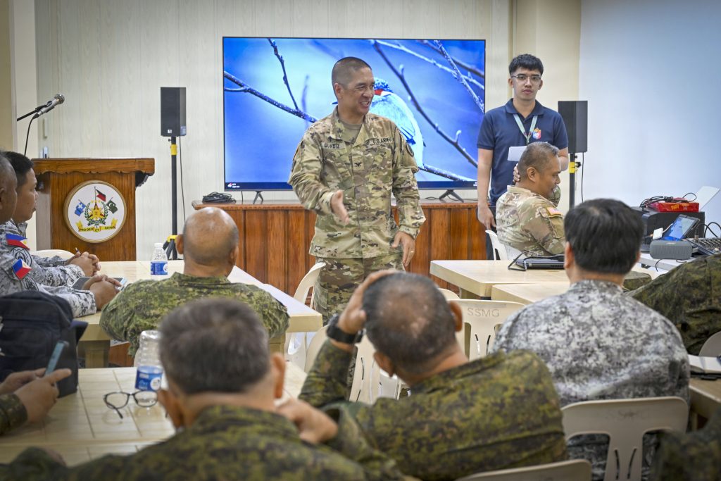 Col. Christopher Guadiz, Hawai‘i National Guard command chaplain, spoke to counterparts from the Armed Forces of the Philippines during a subject matter expert exchange at Camp General Emilio Aguinaldo, Quezon City, Philippines on Feb. 18, 2026. (U.S. Air National Guard photo by Tech. Sgt. Orlando Corpuz)