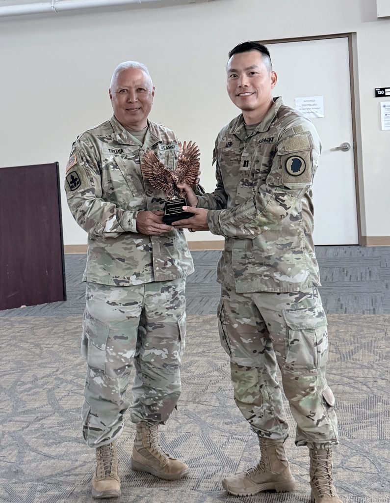 Brig. Gen. Tyson Tahara, HIARNG Commander, presented the Safety Excellence Trophy to Capt. Thomas Lee, Commander of Headquarters, HRMD. (U.S. Army National Guard photos by Chief Warrant Officer 5 John Yim)