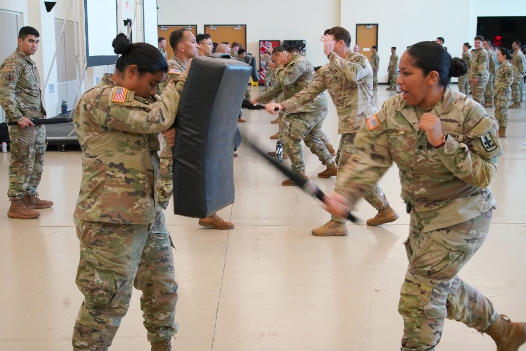 Soldiers with the Hawai’i National Guard conduct civil disturbance training at the 29th Readiness Center, Kalaeloa, Hawaiʻi, in March. The training, where soldiers acted as both protesters and responders, is part of an effort to meet updated federal guidelines for the National Guard Response Force, which focuses on de-escalation, site security and the protection of critical infrastructure. (U.S. Army National Guard photos by Rachel Blaire and retired Master Sgt. Andrew Jackson)