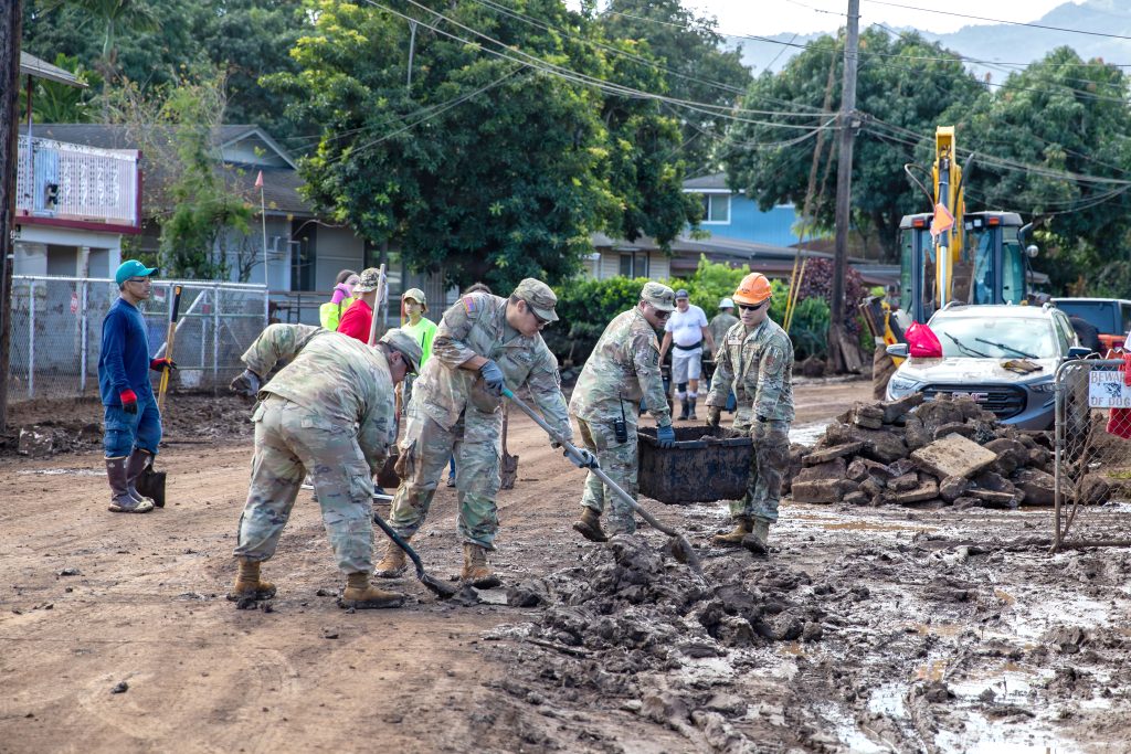 Hawai‘i National Guard members removed debris, cleared mud and provided sandbags and potable water to the Waialua community after the Kona Low storms and severe weather events in March and April. (U.S. Army National Guard photos by Spc. Donald Bond)