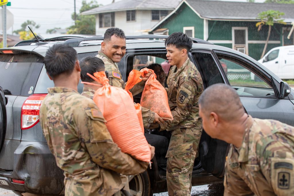 Hawai‘i National Guard members removed debris, cleared mud and provided sandbags and potable water to the Waialua community after the Kona Low storms and severe weather events in March and April. (U.S. Army National Guard photos by Spc. Donald Bond)